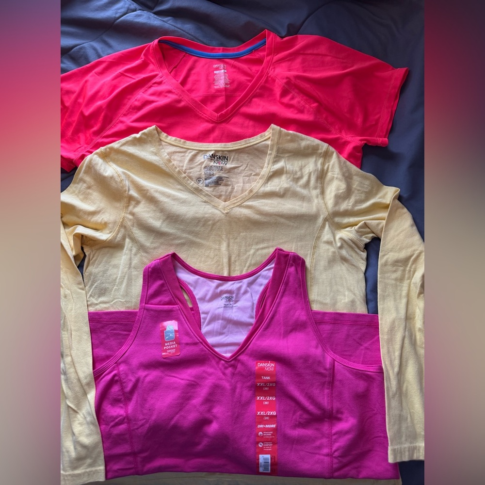 3 active shirts. 1 tank, 1 short sleeved, 1 long sleeved
